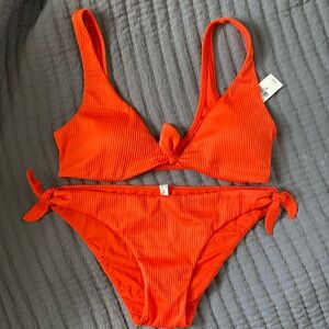 Top and bottom swim suit